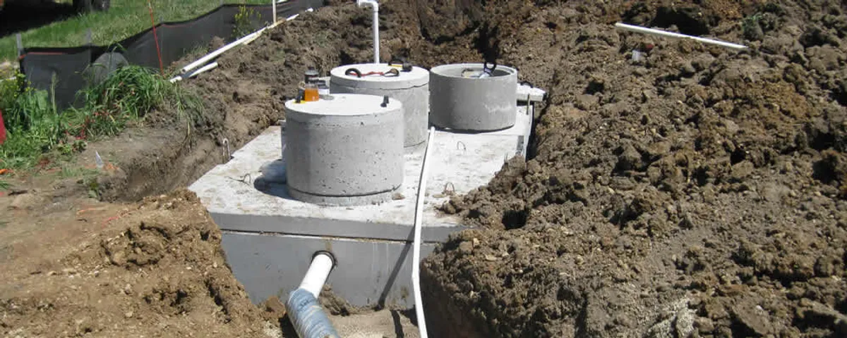 Septic system repair and installation site with tank access ports in Stockton, CA